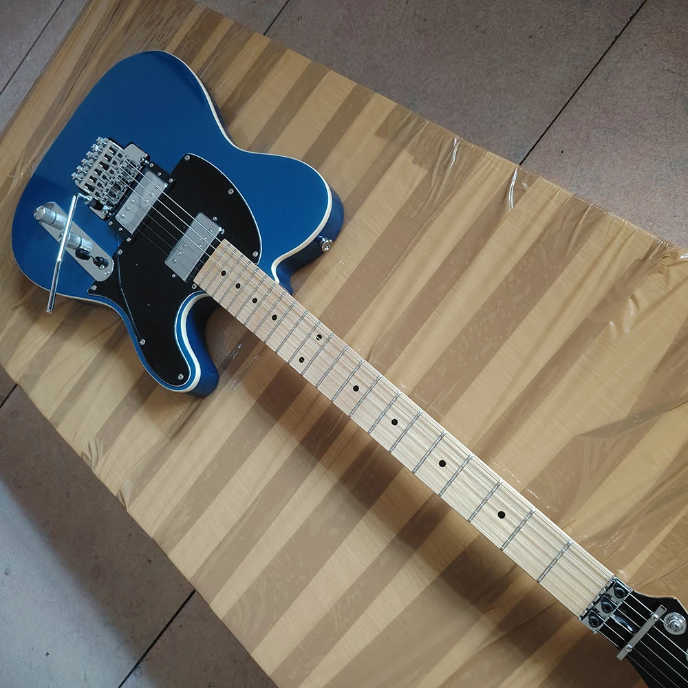 TL electric guitar with blue silver powder particles in stock, Freud vibrato system, dual point-to-point high-end pickup,
TL electric guitar with blue silver powder particles in stock, Freud vibrato system, dual point-to-point high-end pickup,