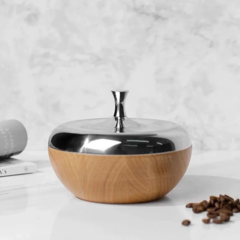Modern stainless steel solid wood round snack jar jewelry jar high-end home decoration dining table hotel decoration
Modern stainless steel solid wood round snack jar jewelry jar high-end home decoration dining table hotel decoration