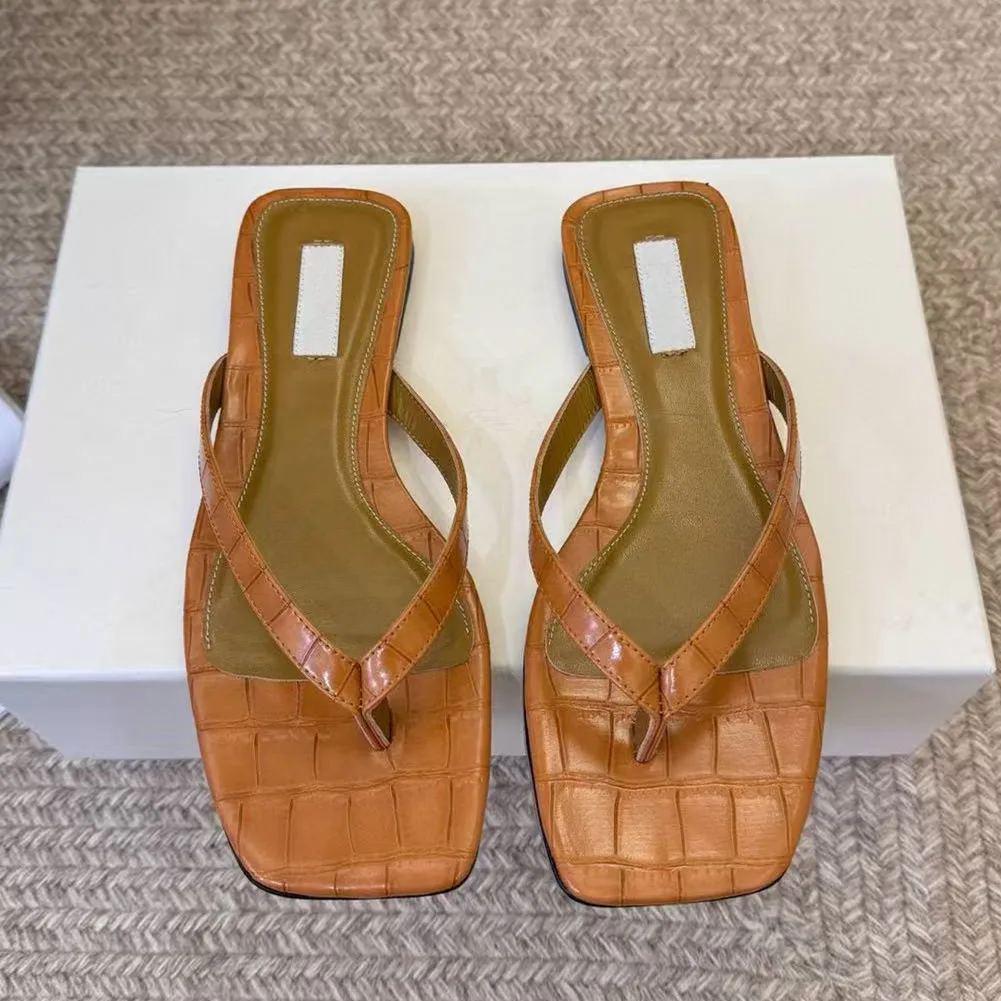 2026 new leather high-heeled flip flops, toe sandals, square headed cat heel beach slippers, slim heel sandals for women
2026 new leather high-heeled flip flops, toe sandals, square headed cat heel beach slippers, slim heel sandals for women