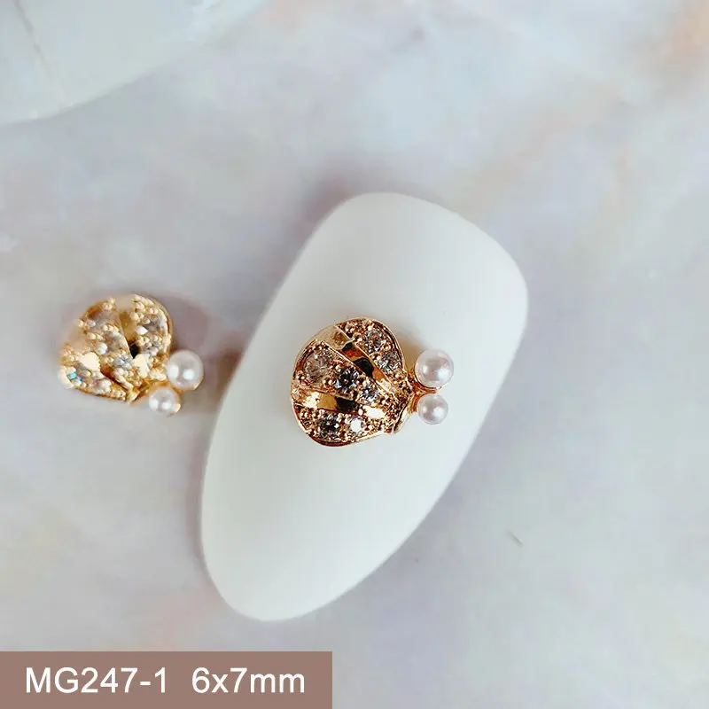10pcs/lot MG247 Summer Shell Zircon Nail Art Crystals Pearl Jewelry Rhinestone DIY Nails Accessories Supplies Decorations Charms
10pcs/lot MG247 Summer Shell Zircon Nail Art Crystals Pearl Jewelry Rhinestone DIY Nails Accessories Supplies Decorations Charms