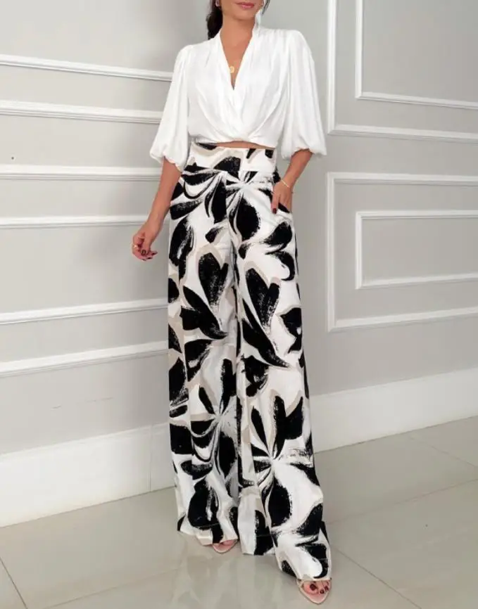 New Fashion 2025 Summer Sexy Elegant 2 Pieces Outfit Wrap Plunge V Neck Crop Blouse and Casual Floral Print Wide Leg Pants Set
New Fashion 2025 Summer Sexy Elegant 2 Pieces Outfit Wrap Plunge V Neck Crop Blouse and Casual Floral Print Wide Leg Pants Set