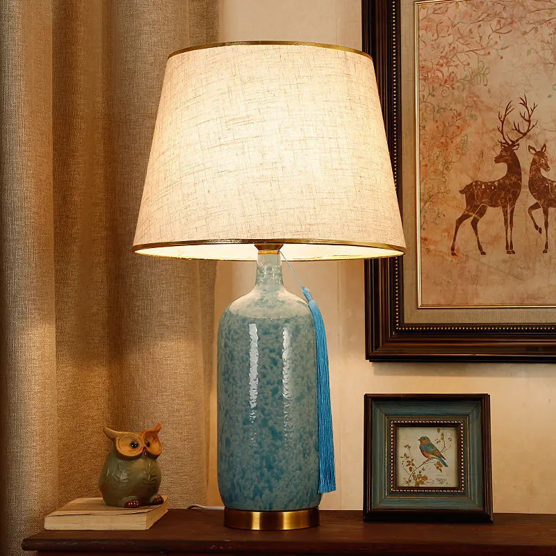 New Chinese ceramic table lamp large living room bedroom bedside lamp American retro warm romantic villa decorative lamps
New Chinese ceramic table lamp large living room bedroom bedside lamp American retro warm romantic villa decorative lamps