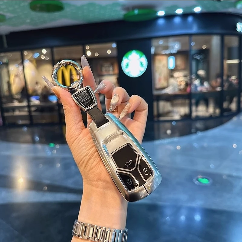 Suitable for Audi key protection case new A4L/Q5L/A5/Q7/RS4/RS5/S5/S4 buckle shell metal buckle shell key box
Suitable for Audi key protection case new A4L/Q5L/A5/Q7/RS4/RS5/S5/S4 buckle shell metal buckle shell key box