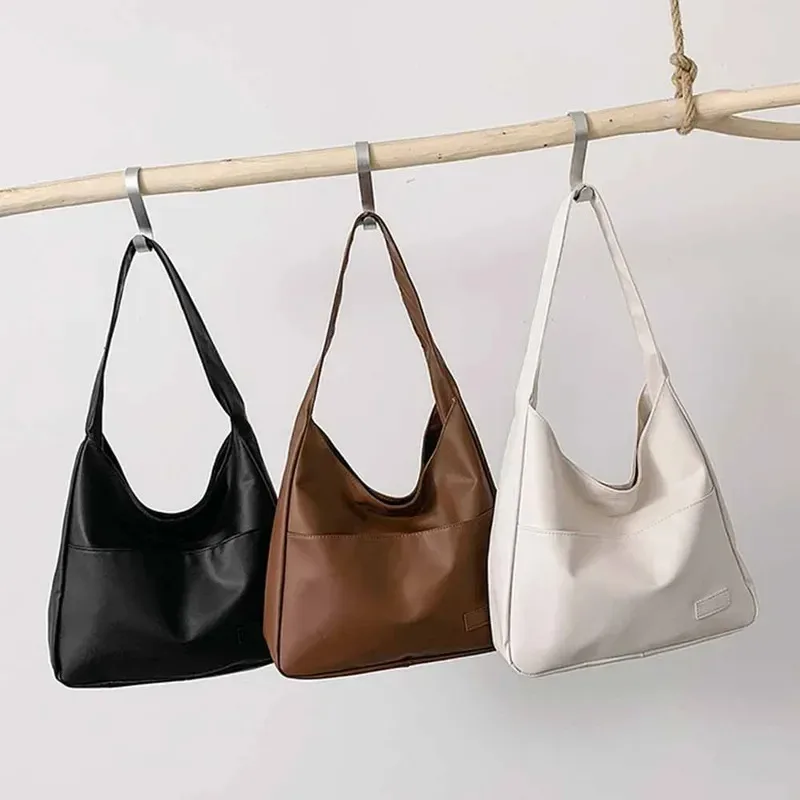 Simple large capacity casual retro shoulder bag, casual commuting fashionable handbag
Simple large capacity casual retro shoulder bag, casual commuting fashionable handbag