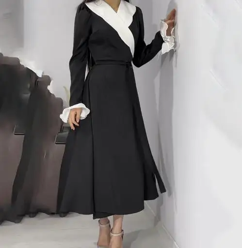 Autumn Women's Elegant French Ruffle Hem Temperament Black and White Contrast Color Splicing Ruffle Sleeves Slim Fit Long Skirt
Autumn Women's Elegant French Ruffle Hem Temperament Black and White Contrast Color Splicing Ruffle Sleeves Slim Fit Long Skirt