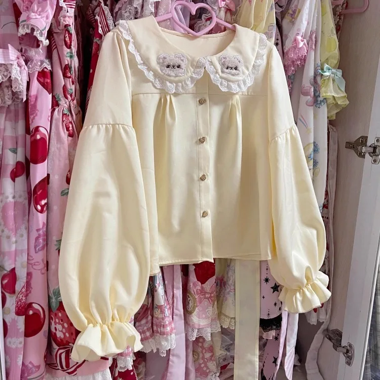 Japanese Cute Lolita Style Blouses Women Kawaii Bear Ear Embroidery Peter Pan Collar Shirts Tops Sweet Puff Sleeve Blusas Mujer
Japanese Cute Lolita Style Blouses Women Kawaii Bear Ear Embroidery Peter Pan Collar Shirts Tops Sweet Puff Sleeve Blusas Mujer