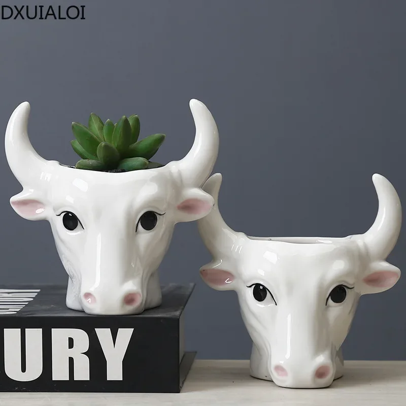 1pcs modern minimalist creative white ceramic animal cow sculpture flower pot succulent potted desktop green plant decoration
1pcs modern minimalist creative white ceramic animal cow sculpture flower pot succulent potted desktop green plant decoration