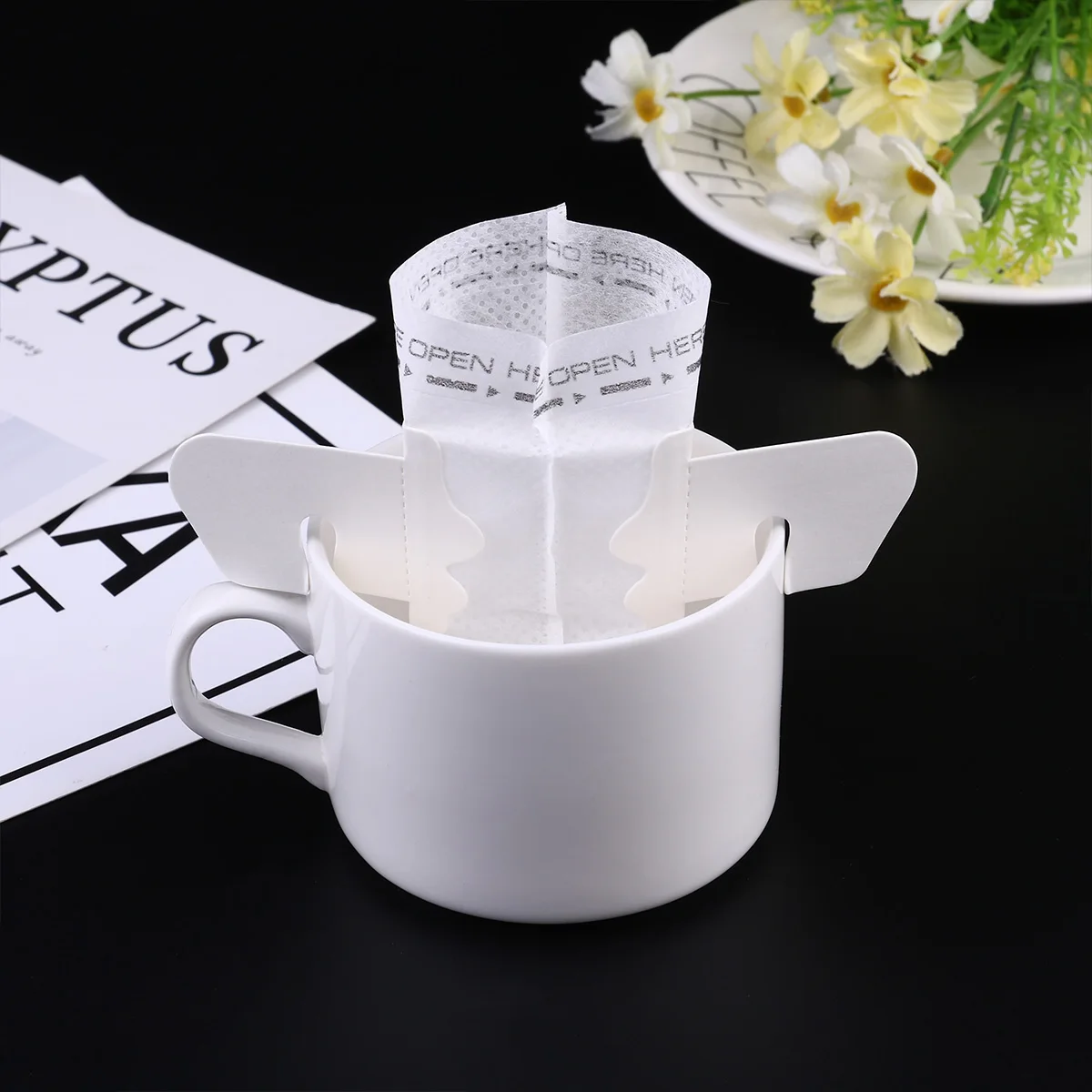 50Pcs Drip Coffee Filter Pour-over Coffee Bag Hanging Ear Portable Home Office Coffee Filter Paper Heatproof Filter (White)
50Pcs Drip Coffee Filter Pour-over Coffee Bag Hanging Ear Portable Home Office Coffee Filter Paper Heatproof Filter (White)