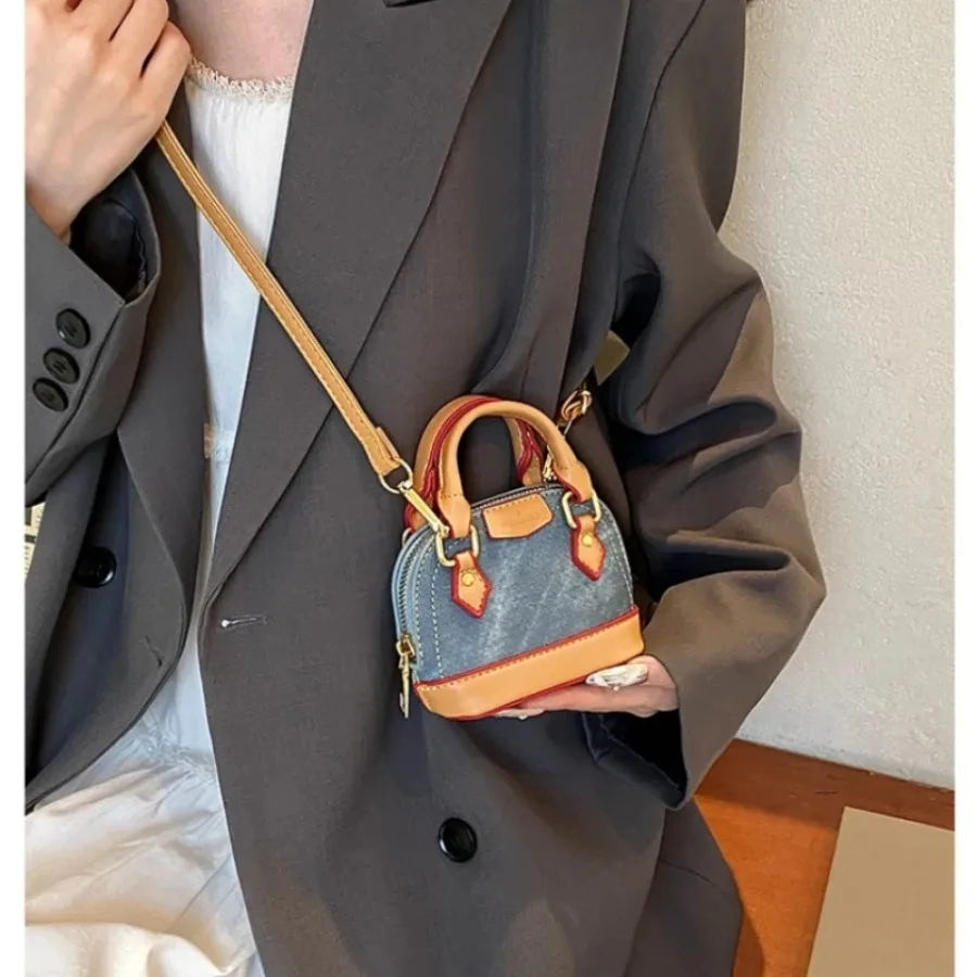 Summer fashion ins classic exquisite cute simple leisure mini color collision shell bag handbag key crossbody female bags
Summer fashion ins classic exquisite cute simple leisure mini color collision shell bag handbag key crossbody female bags