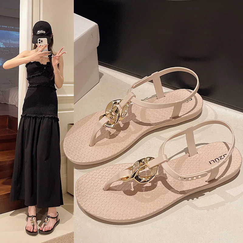Roman sandals for women wearing open toed flat sandals on the beach
Roman sandals for women wearing open toed flat sandals on the beach