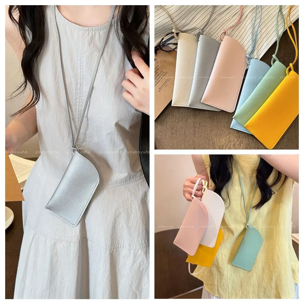 Fashion PU Leather Glasses Bag Portable Hanging Neck Sunglasses Storage Bag Universal Simple Sunglasses Protective Case
Fashion PU Leather Glasses Bag Portable Hanging Neck Sunglasses Storage Bag Universal Simple Sunglasses Protective Case