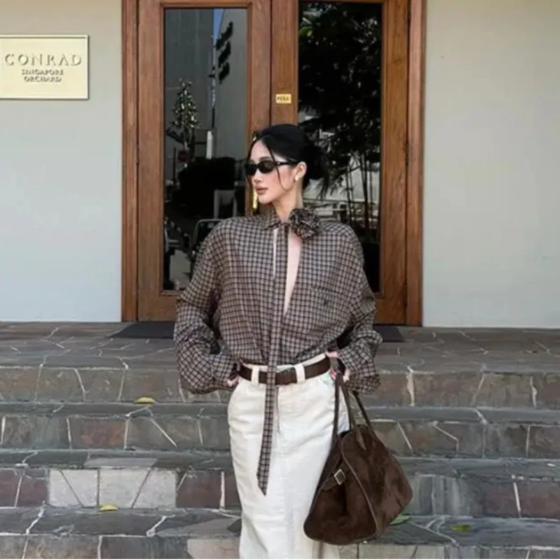 Модная женская рубашка в стиле ретро с цветочным декором, ажурным V-образным вырезом, в клетку, в корейском стиле, осенняя, элегантная, с длинными рукавами, свободного кроя
Модная женская рубашка в стиле ретро с цветочным декором, ажурным V-образным вырезом, в клетку, в корейском стиле, осенняя, элегантная, с длинными рукавами, свободного кроя