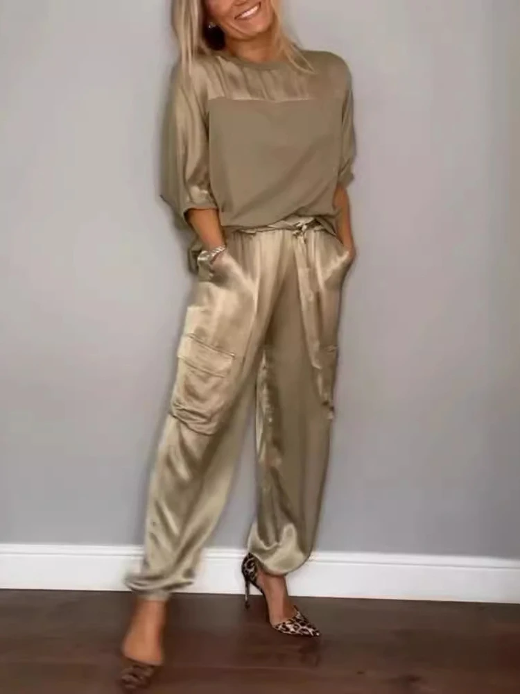 2024 New Spring Summer Women Sets Half Sleeves Patchwork T-shirts Satin Loose Carrot Pants Set
2024 New Spring Summer Women Sets Half Sleeves Patchwork T-shirts Satin Loose Carrot Pants Set