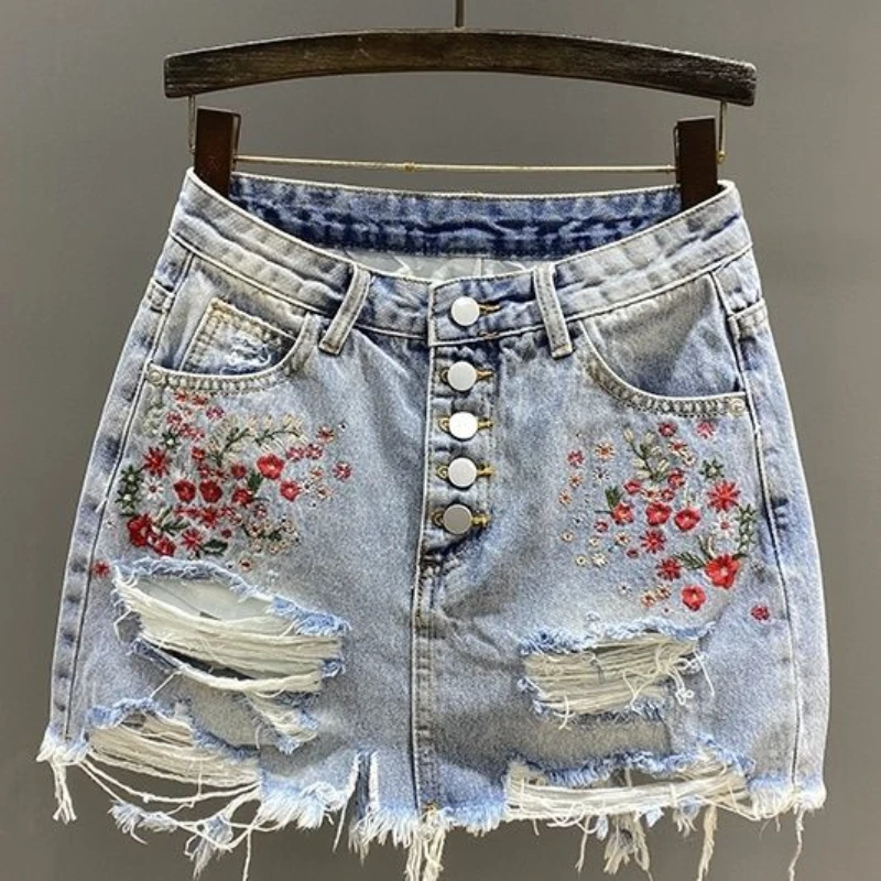 2025 New Summer Women Button Fly Embroidery Ripped Hole Blue Denim Skirt , Woman Designer Black A Line Skirts
2025 New Summer Women Button Fly Embroidery Ripped Hole Blue Denim Skirt , Woman Designer Black A Line Skirts