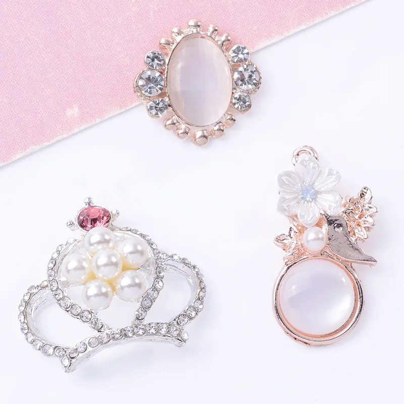 100Pcs sets fashionable hollow inlaid crystal crown with accessories DIY handmade clothing chain stone bird with pendant
100Pcs sets fashionable hollow inlaid crystal crown with accessories DIY handmade clothing chain stone bird with pendant