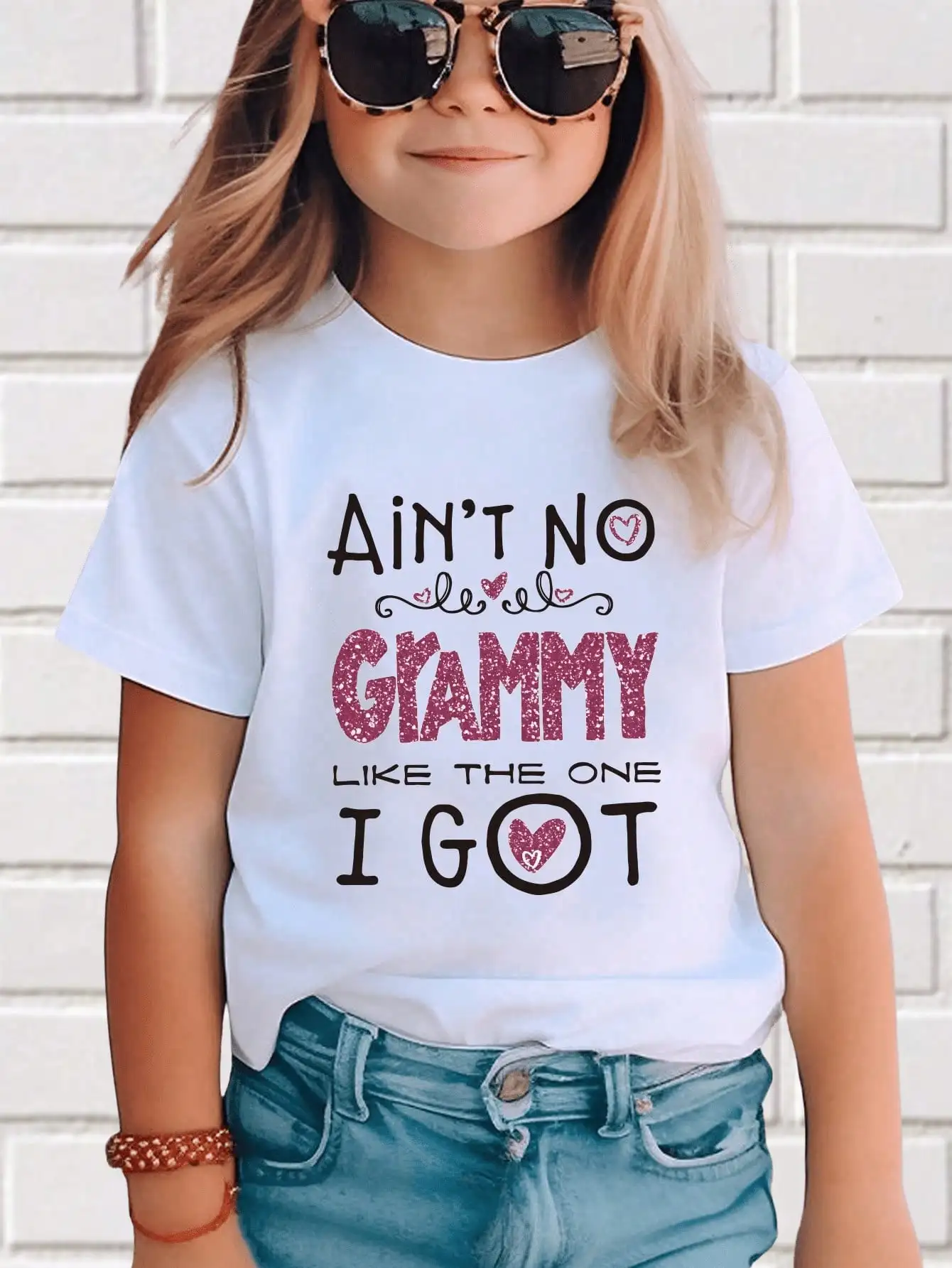 Girls' White Short Sleeve Graphic Tee with Glitter Heart Slogan Print
Girls' White Short Sleeve Graphic Tee with Glitter Heart Slogan Print