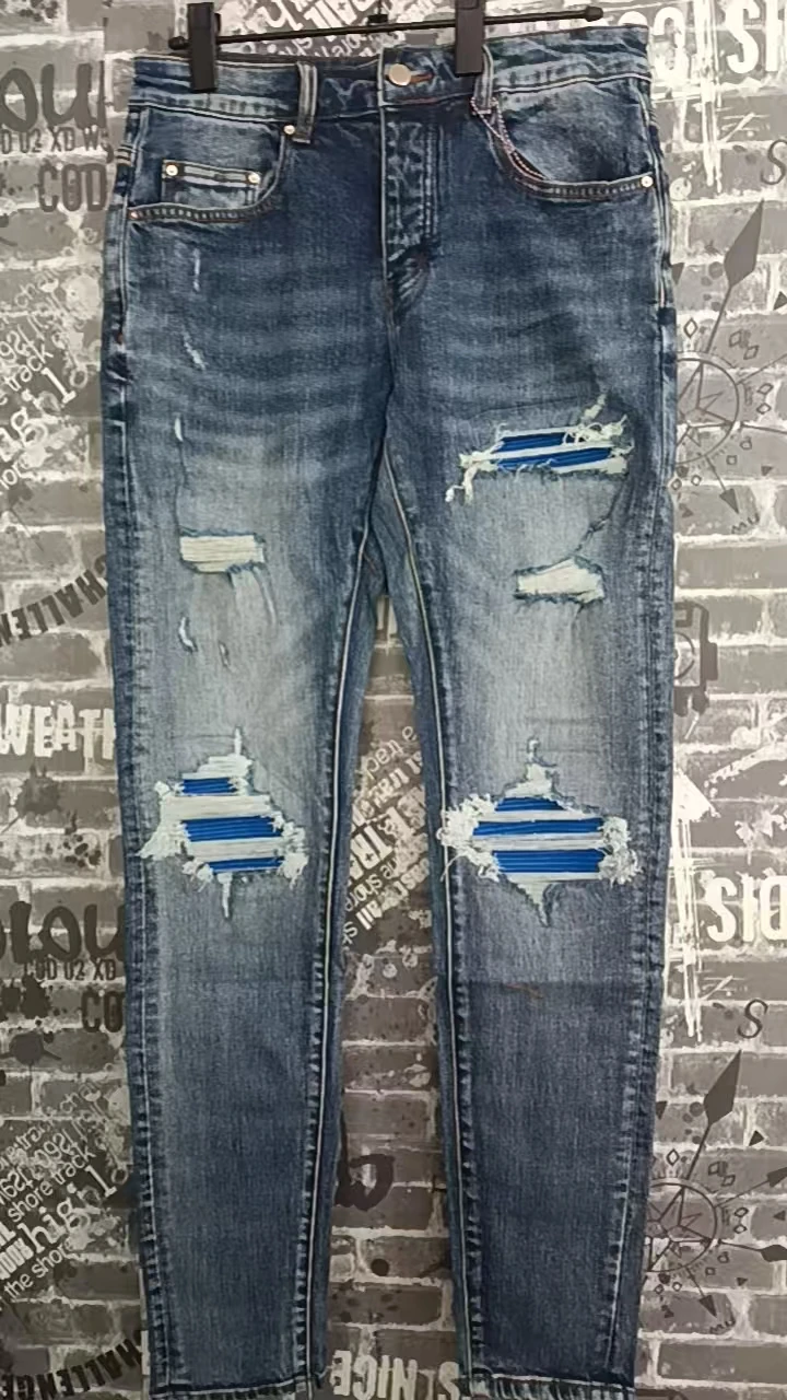 Fashionable new men's retro blue jeans with pleated elastic perforated blue leather patch tight tapered pants Y2K
Fashionable new men's retro blue jeans with pleated elastic perforated blue leather patch tight tapered pants Y2K