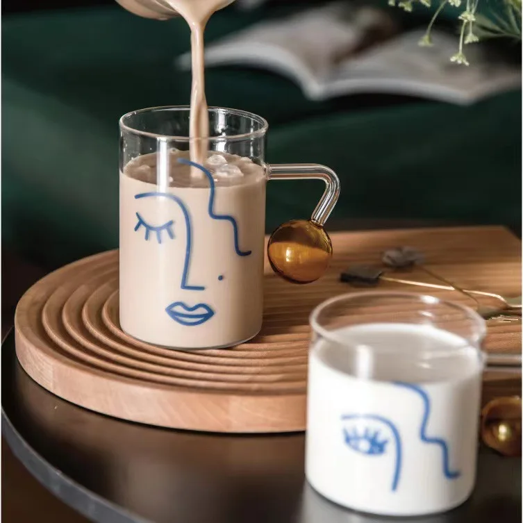Ins handle face glass heat-resistant water cup coffee cup breakfast milk tea cup cold drink juice cup
Ins handle face glass heat-resistant water cup coffee cup breakfast milk tea cup cold drink juice cup