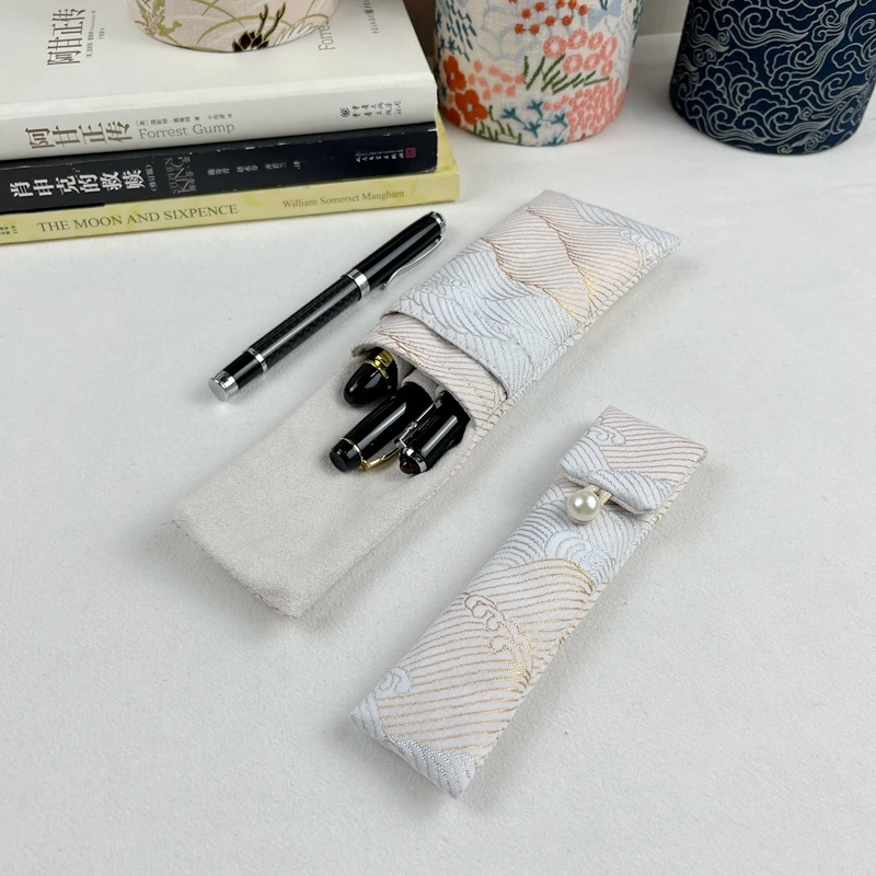 High-quality original handmade pencil bag fabric pen bag pen cover zipper storage bag western woven jacquard fabric
High-quality original handmade pencil bag fabric pen bag pen cover zipper storage bag western woven jacquard fabric