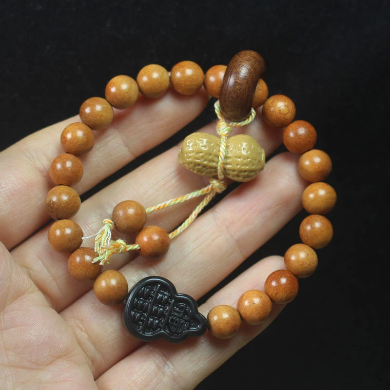 8mm Gourd-shaped Peanut Bead Bracelet for Men Women, Wooden Sandalwood Buddhist Prayer Beads and Jewelry
8mm Gourd-shaped Peanut Bead Bracelet for Men Women, Wooden Sandalwood Buddhist Prayer Beads and Jewelry
