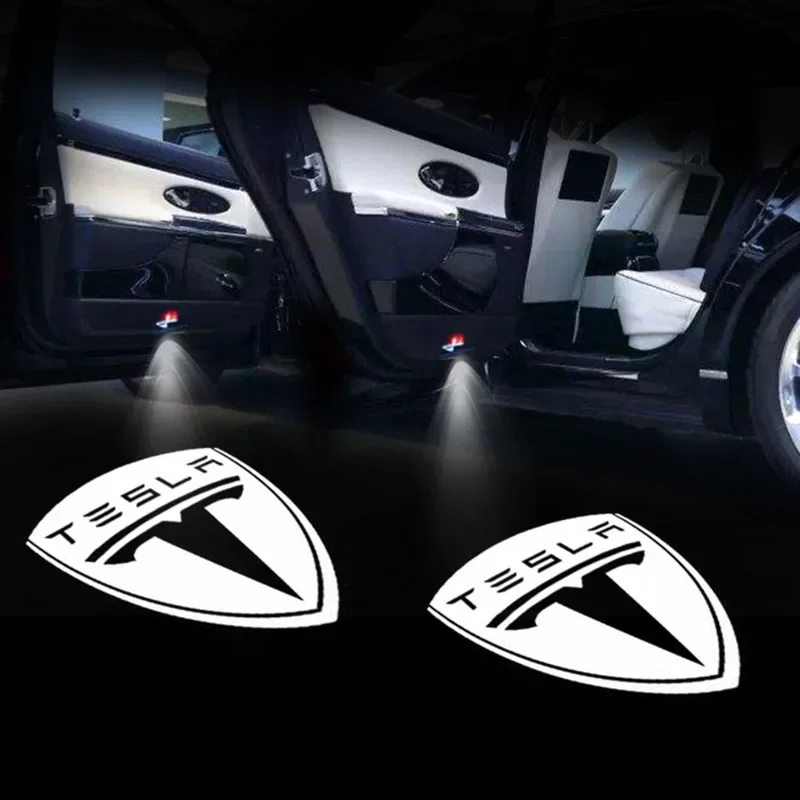 2 шт. для TESLA MODEL S MODEL X MODEL 3 Tesla Courtesy Light Ghost Shadow Light Logo Проектор Лампа Tesla Logo Дверной светильник
2 шт. для TESLA MODEL S MODEL X MODEL 3 Tesla Courtesy Light Ghost Shadow Light Logo Проектор Лампа Tesla Logo Дверной светильник