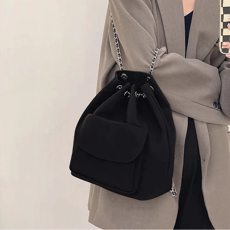 2024 Fashion Casual Travel Drawstring Black Design Fashion Backpack for Women Chain Bucket Bags Girls Nylon Back Packs
2024 Fashion Casual Travel Drawstring Black Design Fashion Backpack for Women Chain Bucket Bags Girls Nylon Back Packs