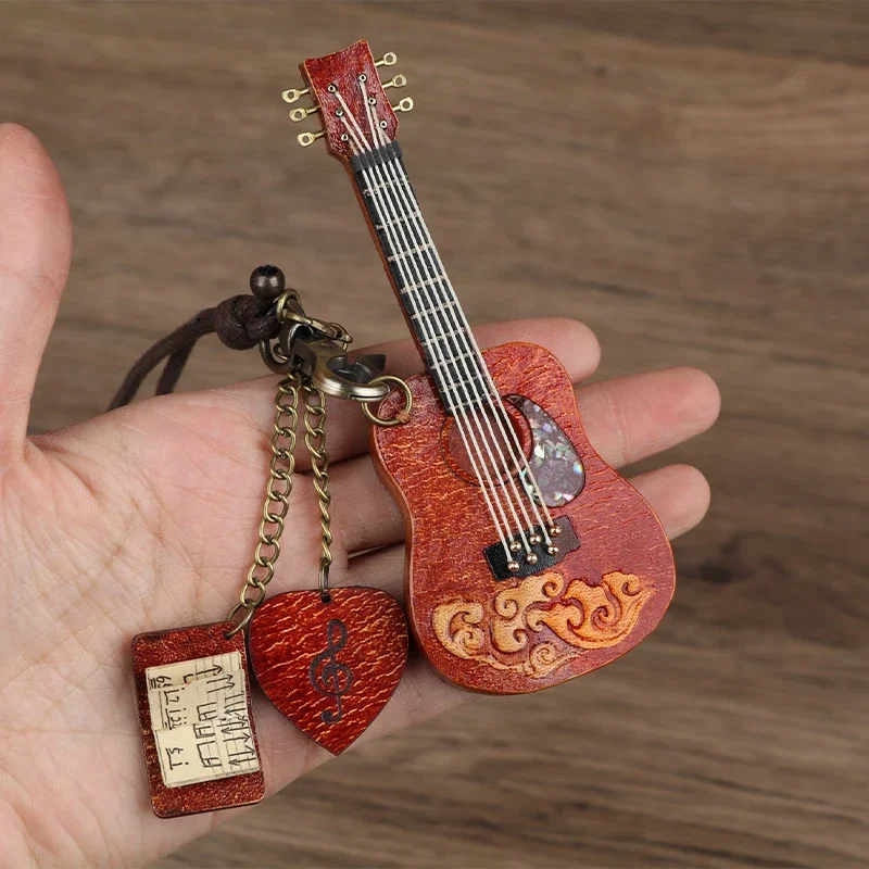 Real CowhideJewelry, Folk Musical Instruments, D/GA Type Guitar, Bags, Pendants, Keychains, Accessories, Music Creative Gifts
Real CowhideJewelry, Folk Musical Instruments, D/GA Type Guitar, Bags, Pendants, Keychains, Accessories, Music Creative Gifts