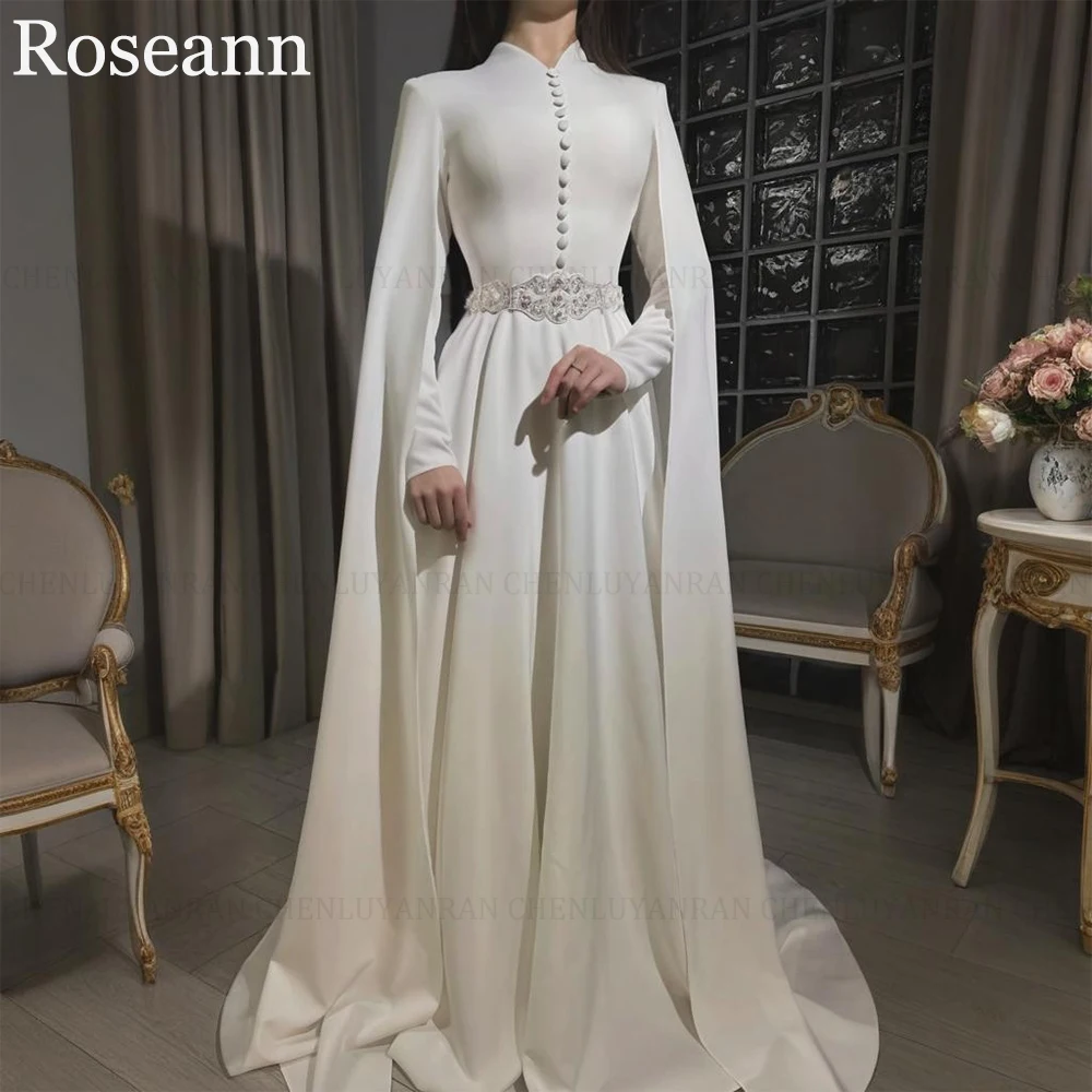 ROSEANN Изысканные мусульманские свадебные платья 2025 года, индивидуальные трапециевидные платья с высоким воротом и пуговицами, аппликация, скромные свадебные платья, Vestidos De Novia
ROSEANN Изысканные мусульманские свадебные платья 2025 года, индивидуальные трапециевидные платья с высоким воротом и пуговицами, аппликация, скромные свадебные платья, Vestidos De Novia