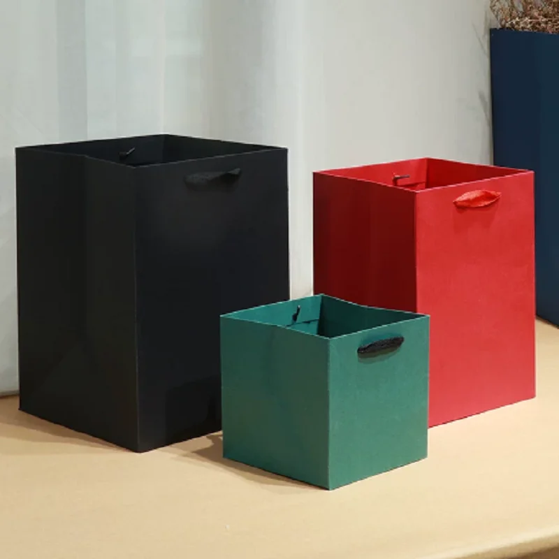 Square Paper Bag Portable Shopping bag Kraft paper packaging bag for gift Beverages and snacks beverage Souvenir handbag
Square Paper Bag Portable Shopping bag Kraft paper packaging bag for gift Beverages and snacks beverage Souvenir handbag
