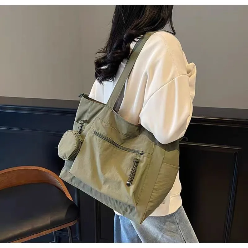 Effortless Nylon Tote Bag for Women - Large Capacity Casual Commuter Bag, Simple & Lightweight Shoulder Crossbody Purse
Effortless Nylon Tote Bag for Women - Large Capacity Casual Commuter Bag, Simple & Lightweight Shoulder Crossbody Purse