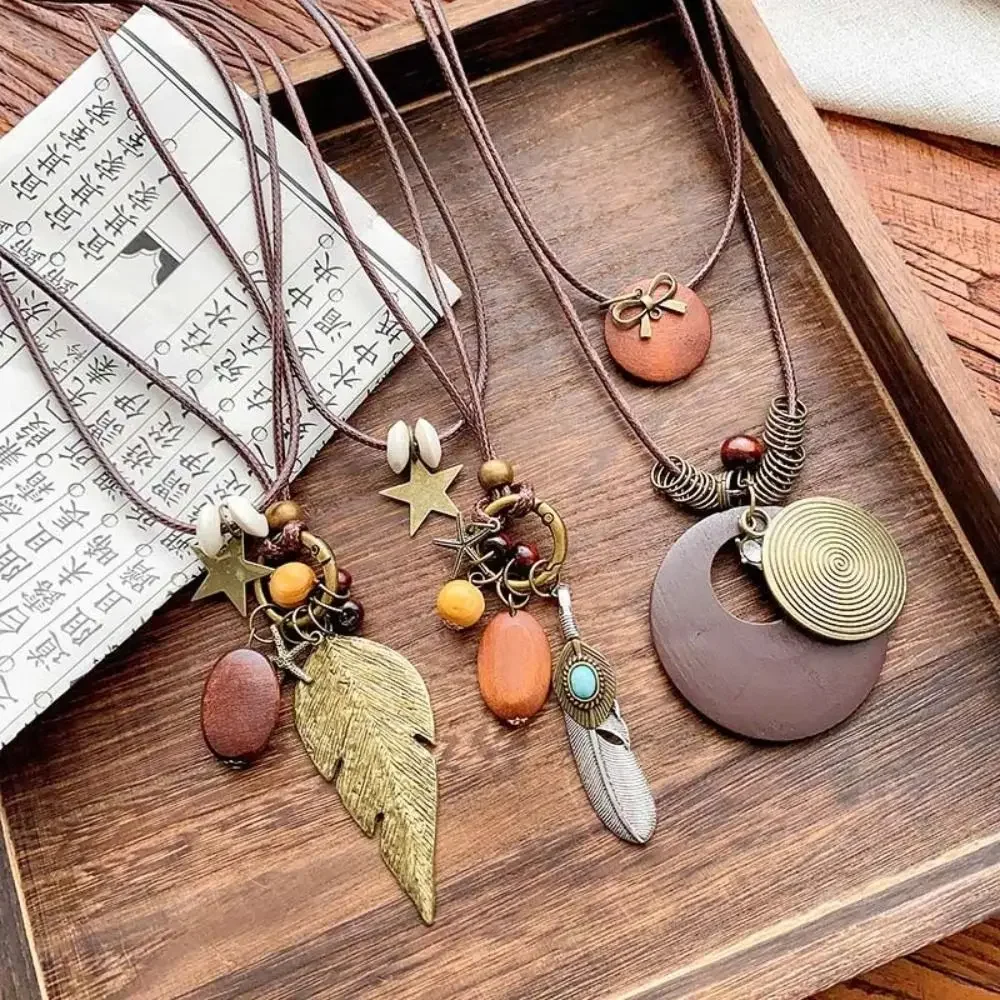 New Chinese Style Feather Leaf Pendant Necklace Vintage Double Layered Long Ropse Necklace Ethnic Brown Sweater Chain Women
New Chinese Style Feather Leaf Pendant Necklace Vintage Double Layered Long Ropse Necklace Ethnic Brown Sweater Chain Women