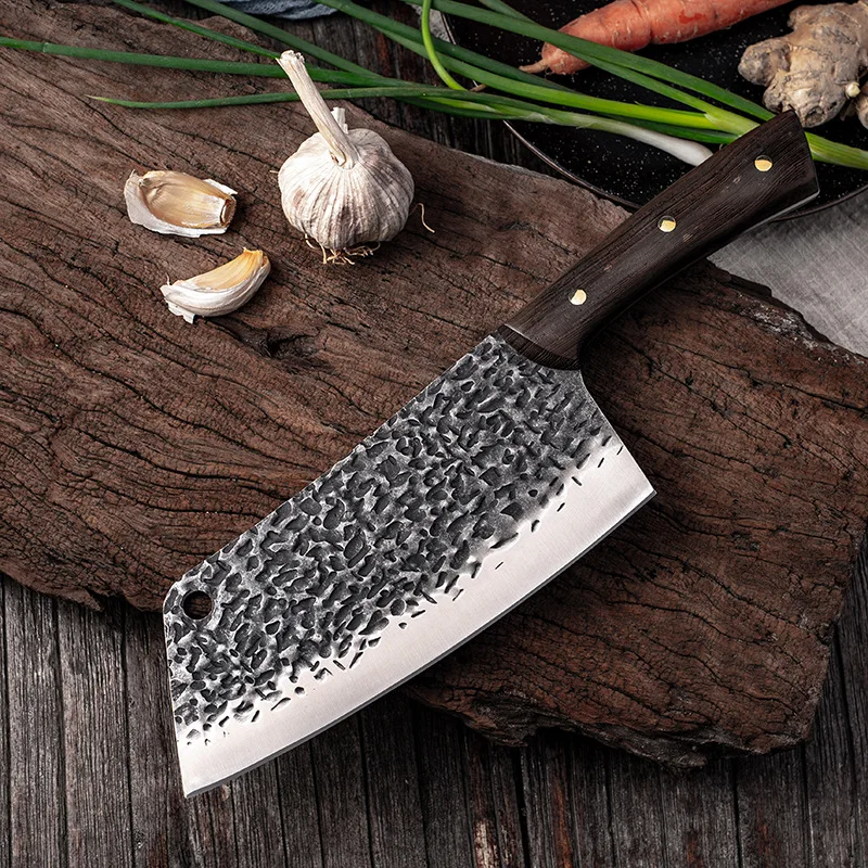 Forged kitchen knife Longquan hammer pattern household kitchen knife stainless steel sliced meat ladies kitchen knife.
Forged kitchen knife Longquan hammer pattern household kitchen knife stainless steel sliced meat ladies kitchen knife.