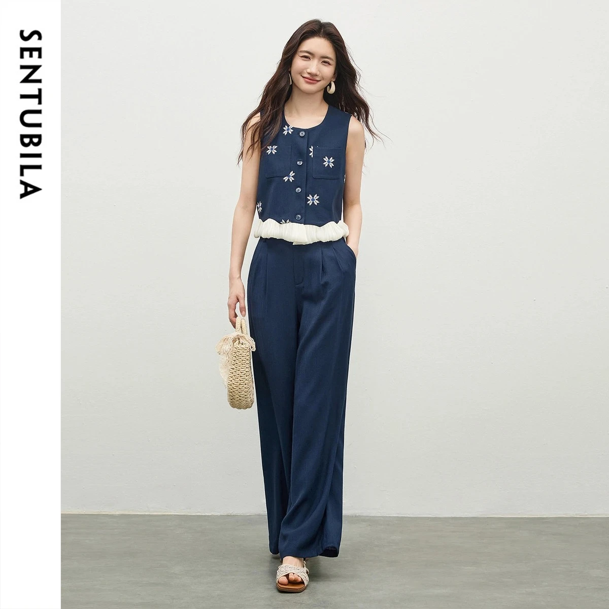 SENTUBILA Women Blue Embroidered Short Vest & Pleated Slimming Wide-leg Pants 2 Pieces Set 2026 Summer Commuter 162ZA6387
SENTUBILA Women Blue Embroidered Short Vest & Pleated Slimming Wide-leg Pants 2 Pieces Set 2026 Summer Commuter 162ZA6387