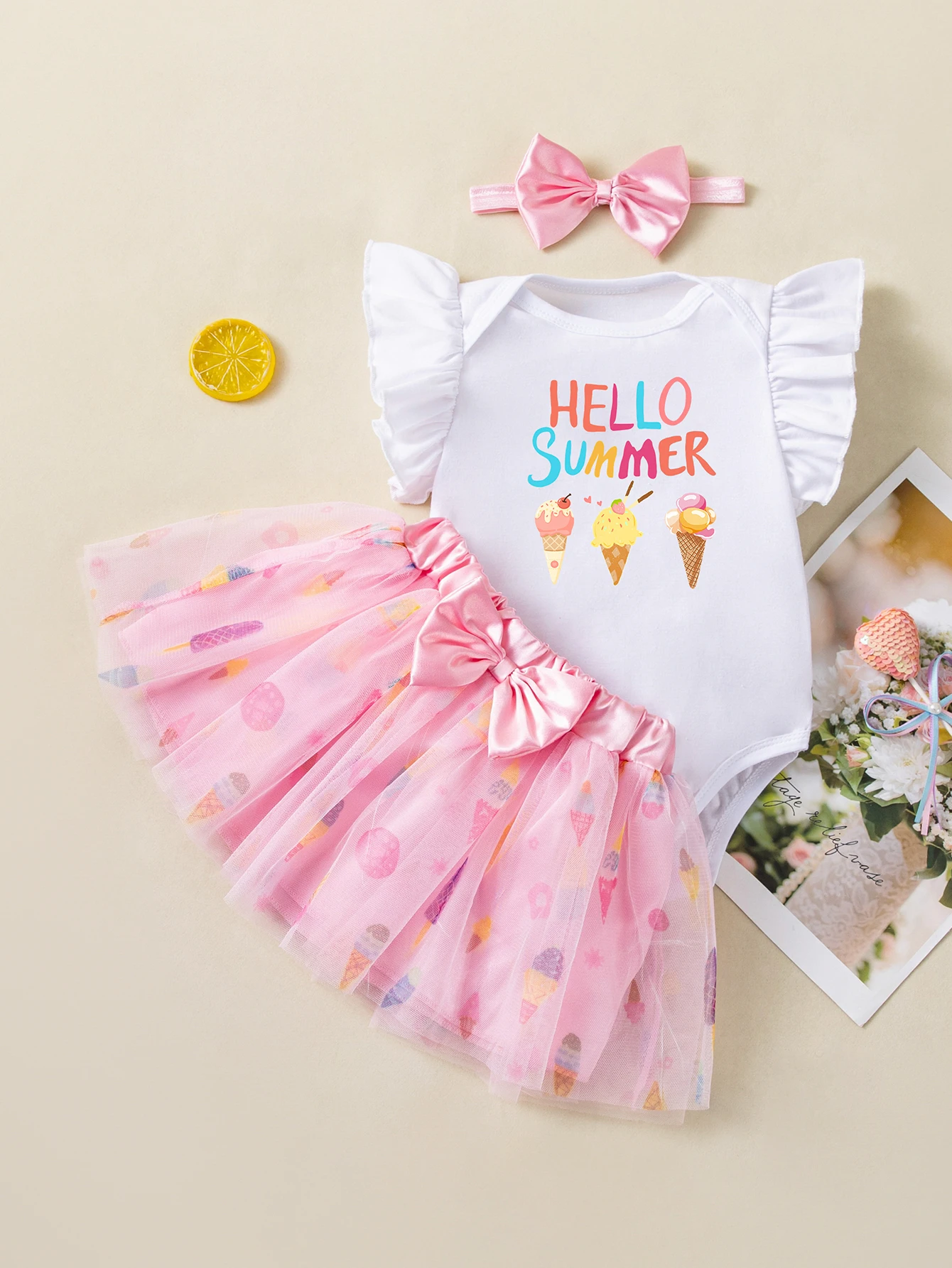 Infant Girl Summer Outfit, Ruffle Sleeve "Hello Summer" Bodysuit + Ice Cream Print Tutu Skirt + Bow Hairband
Infant Girl Summer Outfit, Ruffle Sleeve "Hello Summer" Bodysuit + Ice Cream Print Tutu Skirt + Bow Hairband