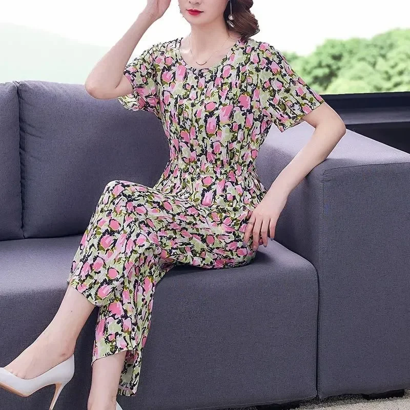 Women Floral Print Cotton Rayon Two Piece Set Round Neck Short Sleeve Tie Waist Wide Leg Cropped Pants Casual Summer Outfit
Women Floral Print Cotton Rayon Two Piece Set Round Neck Short Sleeve Tie Waist Wide Leg Cropped Pants Casual Summer Outfit