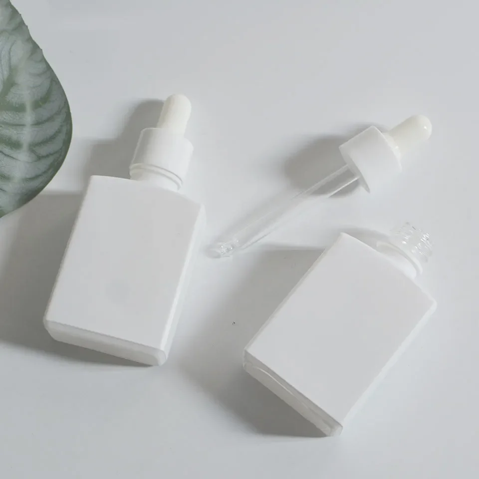 White-coated Square Glass Dropper Bottle for Serum Essential Oil White logo Glass square Perfume Rectangle Glass Dropper Bottle
White-coated Square Glass Dropper Bottle for Serum Essential Oil White logo Glass square Perfume Rectangle Glass Dropper Bottle