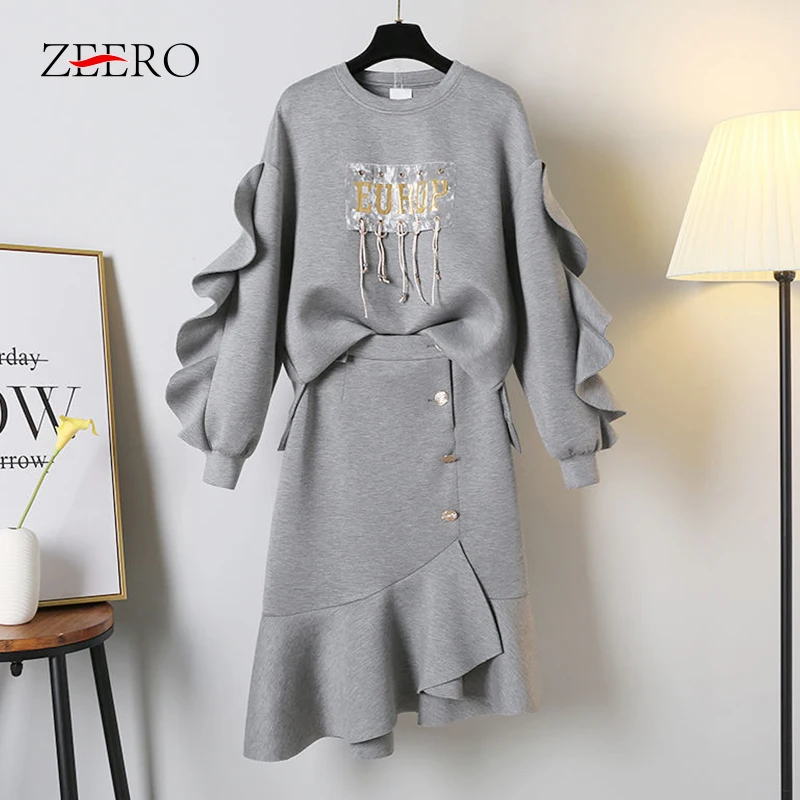 Autumn Tracksuit Two Piece Set Women Ruffles Sleeve Appliques Sweatshirt Tops + Irregular Buttons Skirt Set Suit 4XL
Autumn Tracksuit Two Piece Set Women Ruffles Sleeve Appliques Sweatshirt Tops + Irregular Buttons Skirt Set Suit 4XL