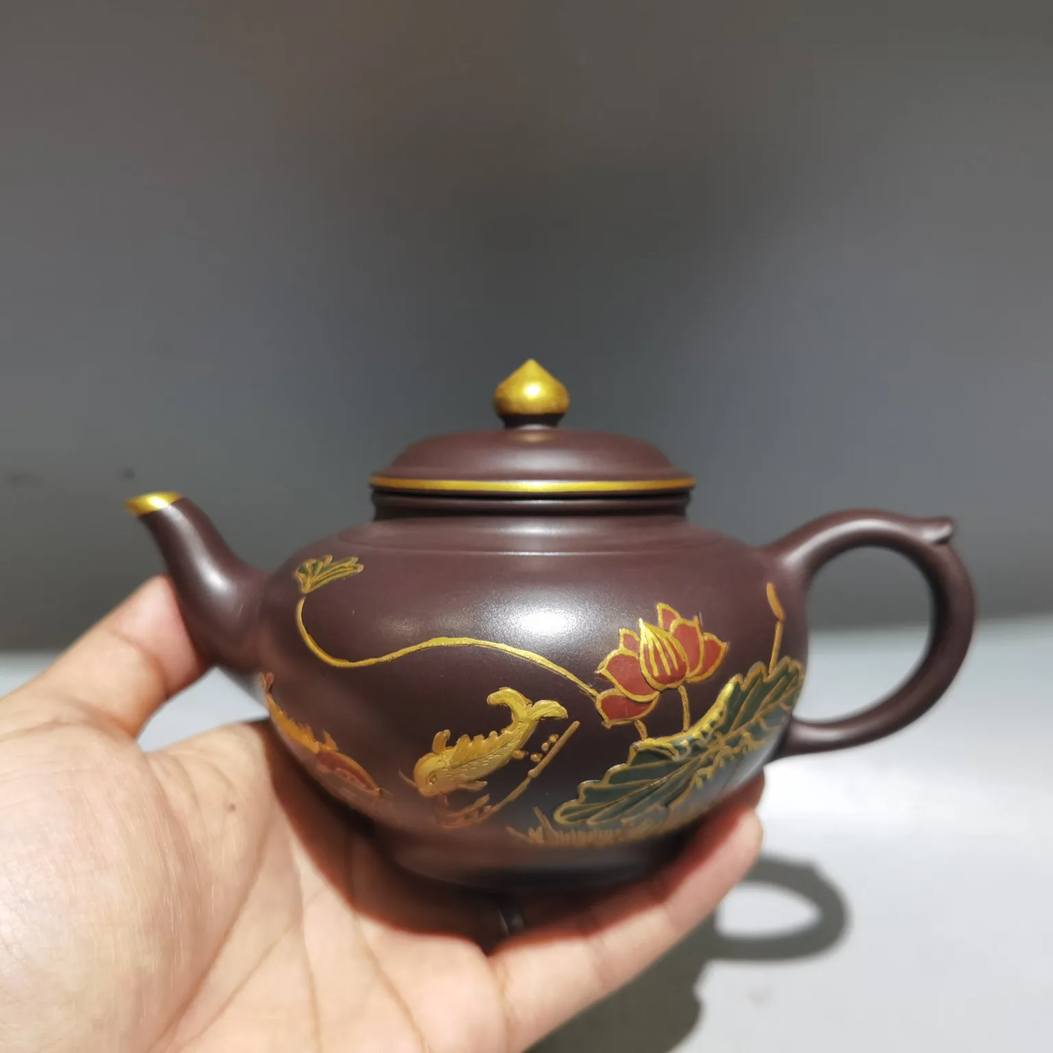 The Classic Purple Clay Teapot is Exquisitely Painted and Crafted With Gold and is Worth Decorating and Collecting
The Classic Purple Clay Teapot is Exquisitely Painted and Crafted With Gold and is Worth Decorating and Collecting