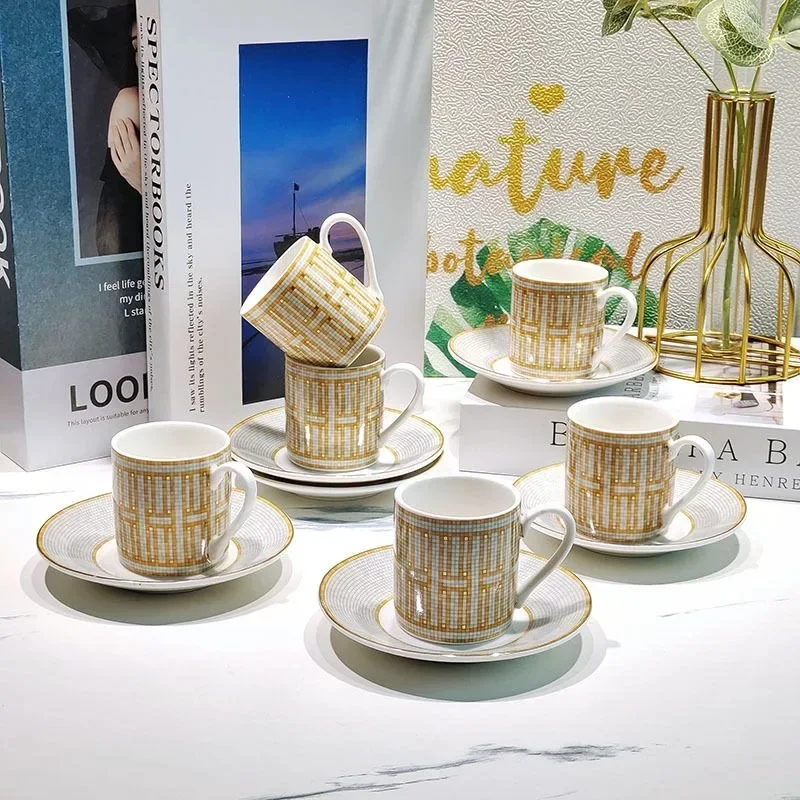 Luxury Golden Design 80ml Ceramic Arabia Espresso Cups Coffee Cup Cute Thermo Design Saudi Teacup And Saucer With Logo Gift Box
Luxury Golden Design 80ml Ceramic Arabia Espresso Cups Coffee Cup Cute Thermo Design Saudi Teacup And Saucer With Logo Gift Box