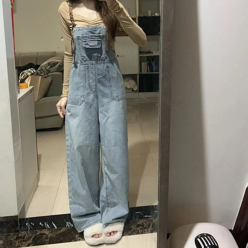 Fashion High Waist Jumpsuit Women Casual Straight Loose Wide Leg Denim Pants Female Overalls Streetwear Cool Back Strap Pants
Fashion High Waist Jumpsuit Women Casual Straight Loose Wide Leg Denim Pants Female Overalls Streetwear Cool Back Strap Pants
