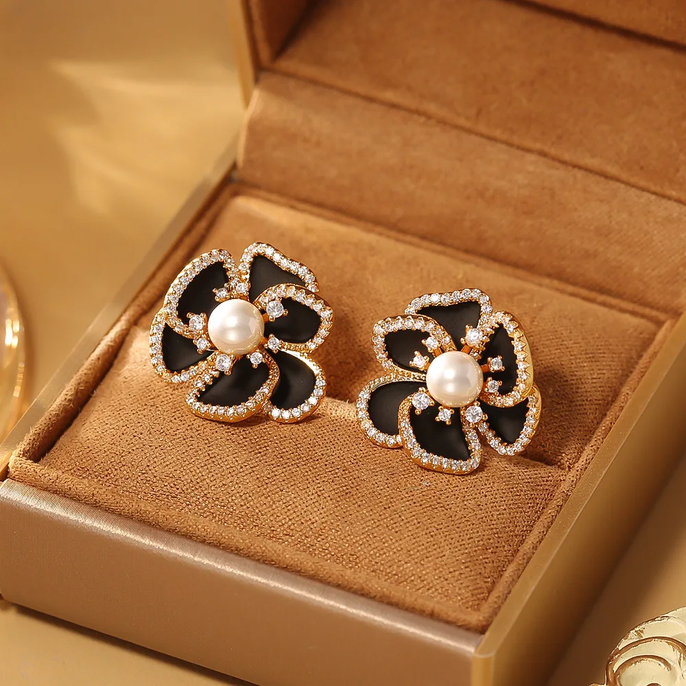 Fashionable and exquisite camellia pearl zircon earrings niche light luxury temperament versatile earrings high-end earrings
Fashionable and exquisite camellia pearl zircon earrings niche light luxury temperament versatile earrings high-end earrings