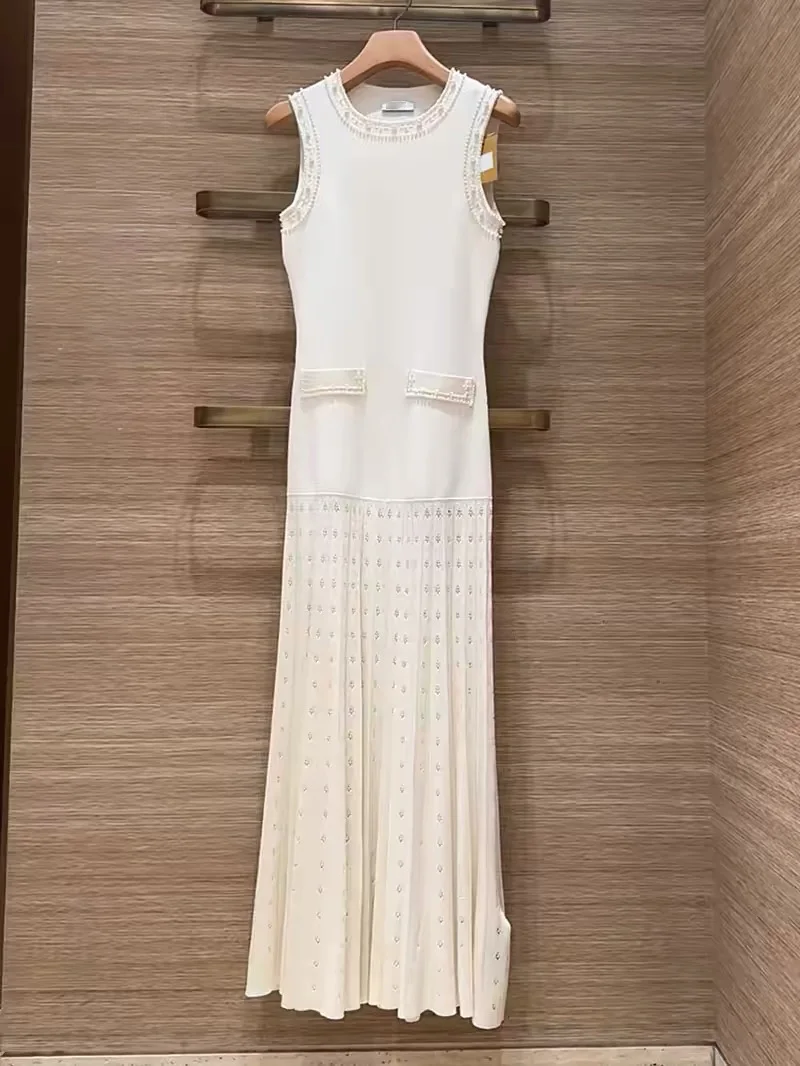 French Style Pearl Decorated round Neck Knitted Open Cardigan Long Sleeveless Dress Women's Soft Cotton Spring Fashion 2026
French Style Pearl Decorated round Neck Knitted Open Cardigan Long Sleeveless Dress Women's Soft Cotton Spring Fashion 2026
