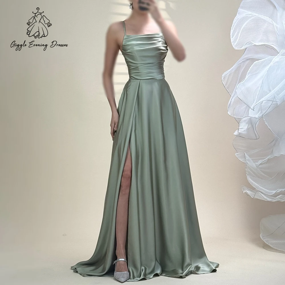 Giggle Sage Зеленое атласное вечернее платье с рюшами Элегантное платье на тонких бретельках с высоким разрезом для выпускного вечера Женское вечернее платье по индивидуальному заказу
Giggle Sage Зеленое атласное вечернее платье с рюшами Элегантное платье на тонких бретельках с высоким разрезом для выпускного вечера Женское вечернее платье по индивидуальному заказу