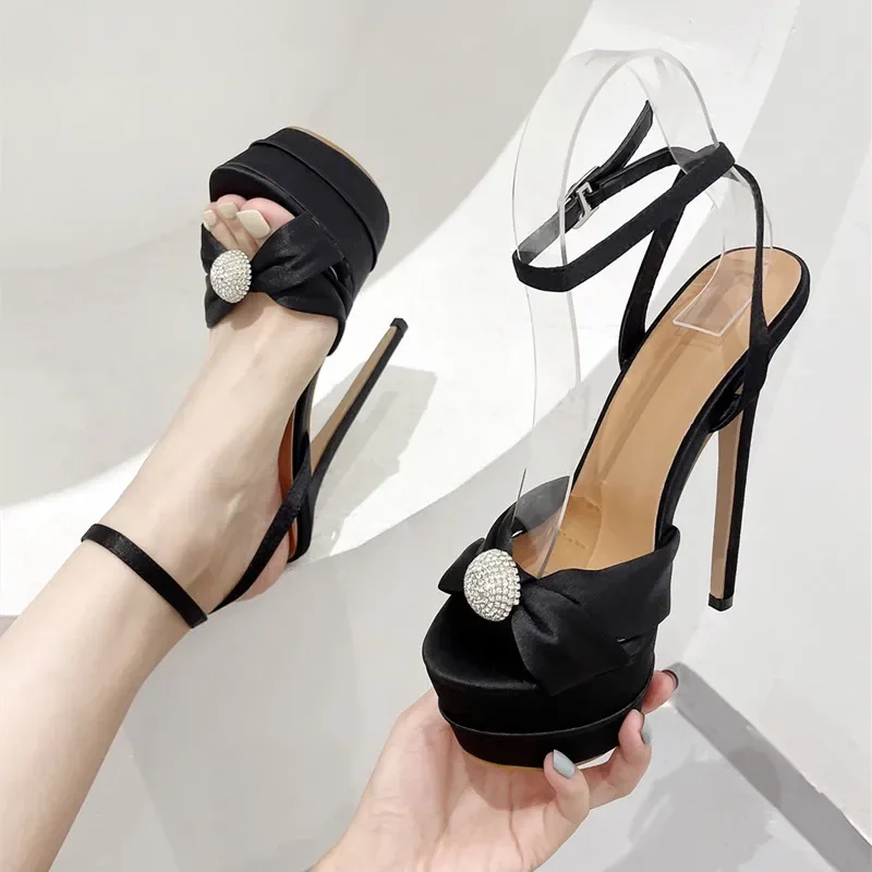 Luxury Crystal Buckle Strap Platform Sandals Sexy Peep Toe 16CM Thin High Heels for Women Elegant Sandals Banquet Party Shoes
Luxury Crystal Buckle Strap Platform Sandals Sexy Peep Toe 16CM Thin High Heels for Women Elegant Sandals Banquet Party Shoes