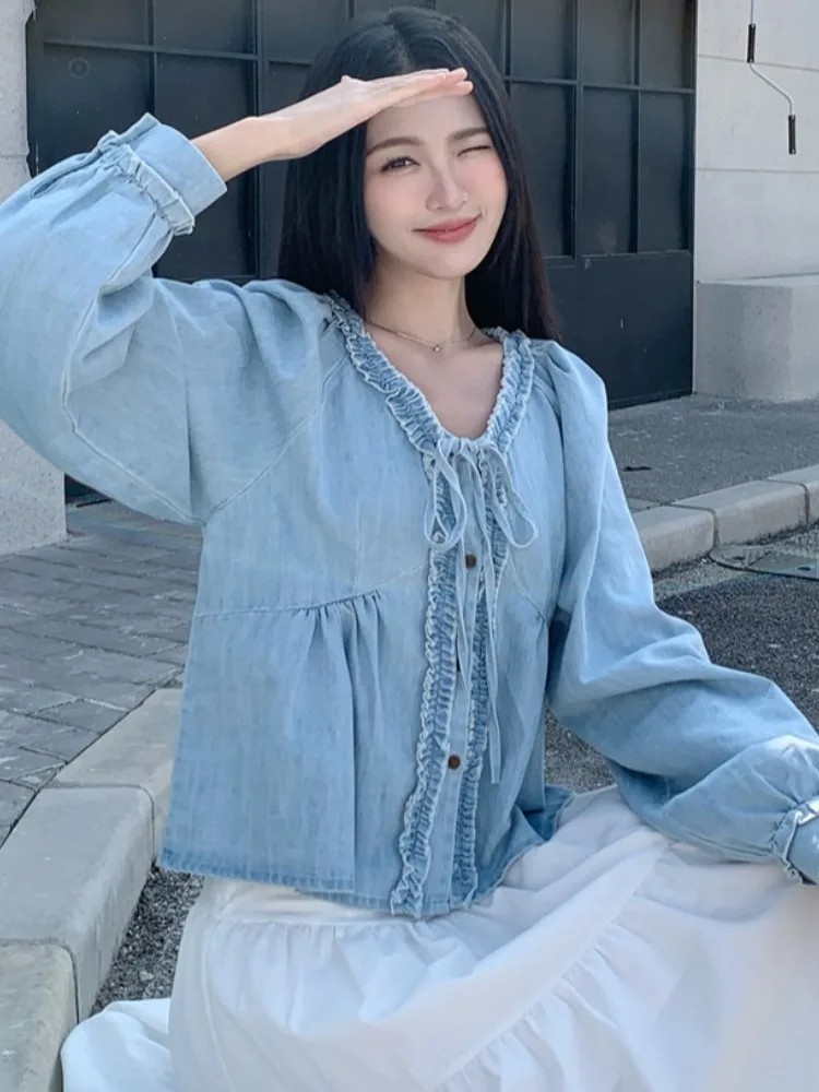 Стильная винтажная весенняя свободная джинсовая рубашка с длинным рукавом и V-образным вырезом, женская модная универсальная повседневная блузка с поясом
Стильная винтажная весенняя свободная джинсовая рубашка с длинным рукавом и V-образным вырезом, женская модная универсальная повседневная блузка с поясом