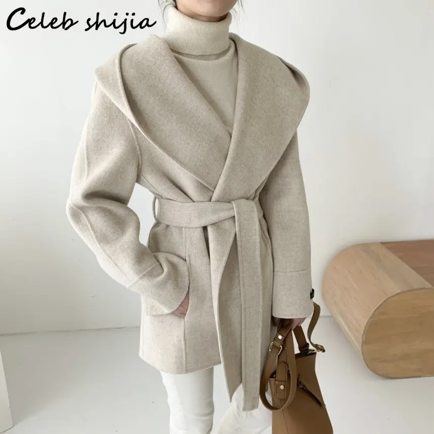Chic Hooded Wool Jacket Women 2023 Winter Camel Solid Lace-up Elegant Blend Coat Ladies Korean Harajuku Thicken Outfit Autumn
Chic Hooded Wool Jacket Women 2023 Winter Camel Solid Lace-up Elegant Blend Coat Ladies Korean Harajuku Thicken Outfit Autumn