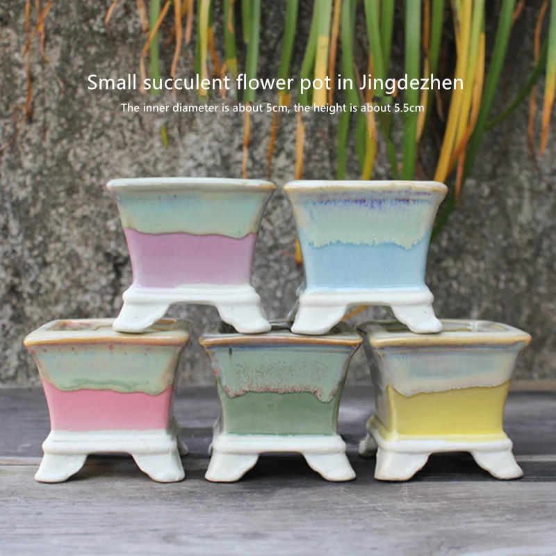 Jingdezhen modern Chinese ceramic small flower pot square mouth small diameter handmade ice crack with foot perforated porcelain
Jingdezhen modern Chinese ceramic small flower pot square mouth small diameter handmade ice crack with foot perforated porcelain