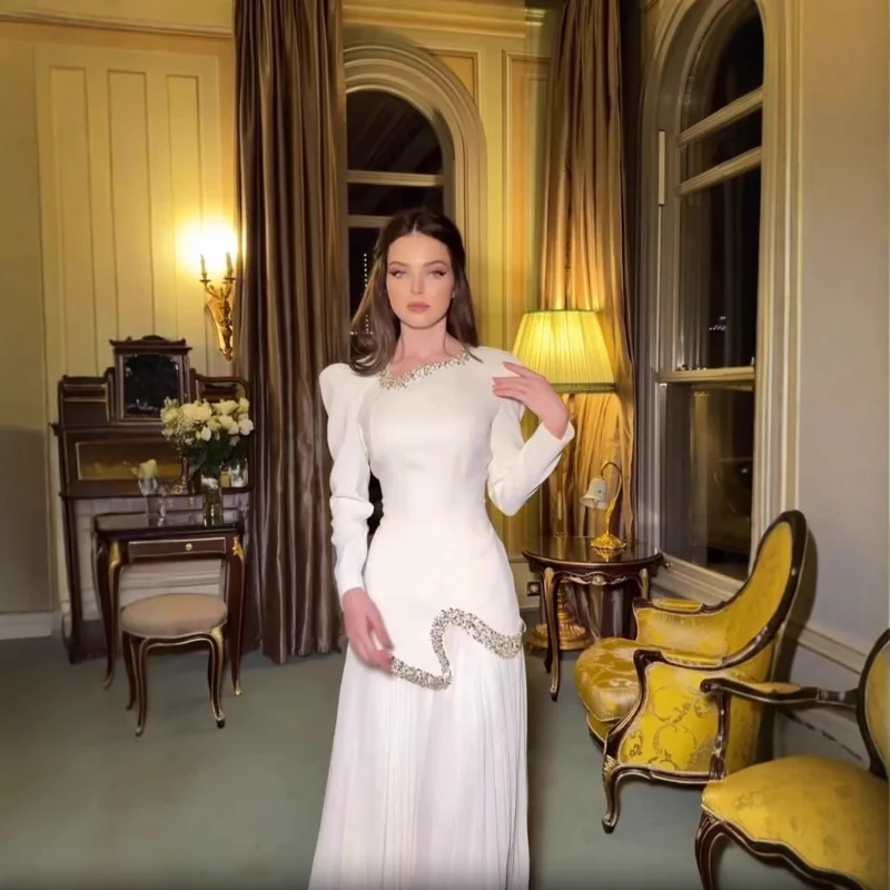 2025 Новые белые платья для выпускного вечера трапециевидной формы длиной до пола, с v-образным вырезом и длинными рукавами, вечернее платье, модное вечернее платье с блестками и бантом на шнуровке 
2025 Новые белые платья для выпускного вечера трапециевидной формы длиной до пола, с v-образным вырезом и длинными рукавами, вечернее платье, модное вечернее платье с блестками и бантом на шнуровке