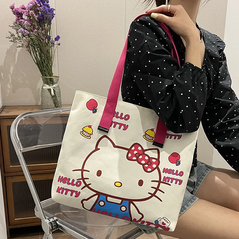 Холщовая Сумка-тоут с Hello Kitty для женщин, милая дамская сумочка для покупок, Роскошный дизайнерский дорожный тоут на ремне
Холщовая Сумка-тоут с Hello Kitty для женщин, милая дамская сумочка для покупок, Роскошный дизайнерский дорожный тоут на ремне