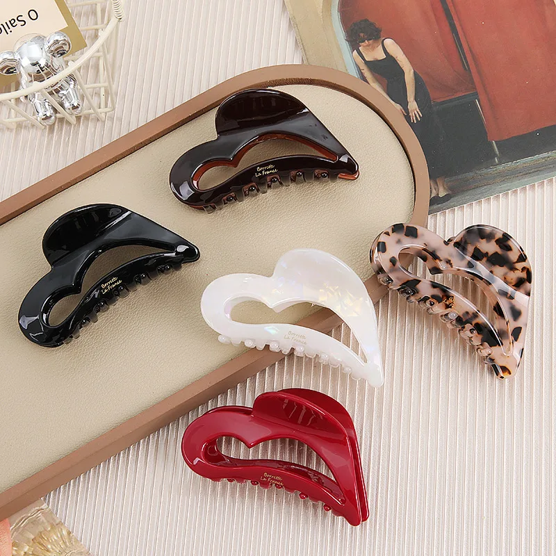 Acetate Hollow Heart Claw Clip Korean Gold Label Elegant Side Hair Clip Luxury Daily Styling Hair Accessories for Women Girls
Acetate Hollow Heart Claw Clip Korean Gold Label Elegant Side Hair Clip Luxury Daily Styling Hair Accessories for Women Girls